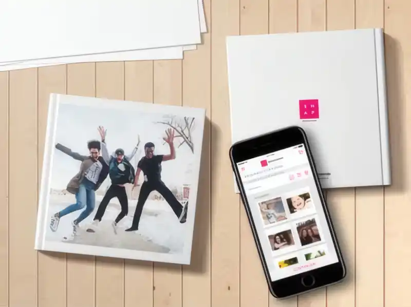 Phone next to a photograph